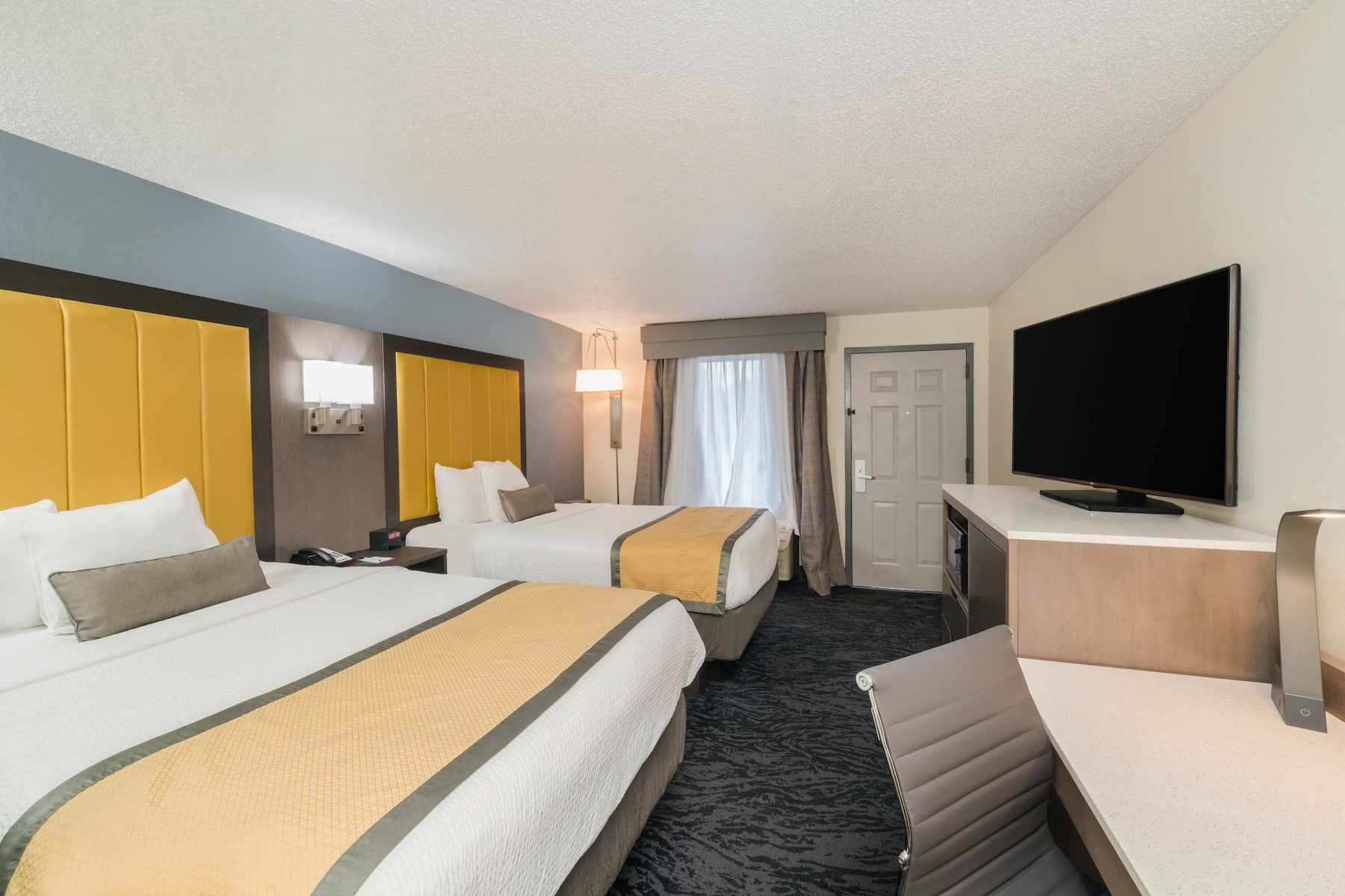 Comfortable guest room at Baymont Franklin Cool Springs